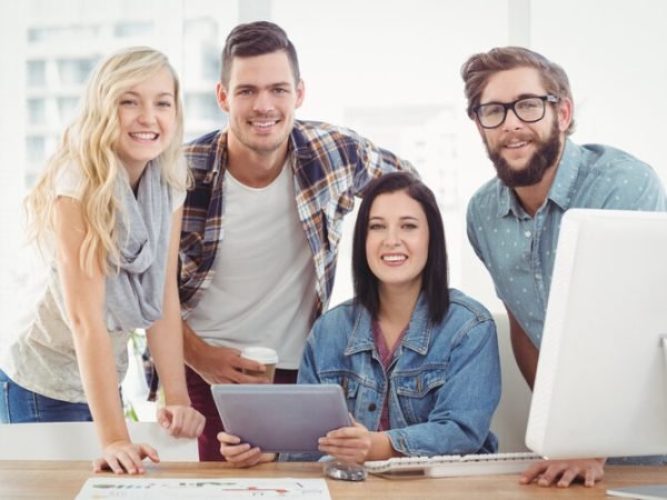 rsz_portrait-smiling-business-professionals-using-digital-tablet